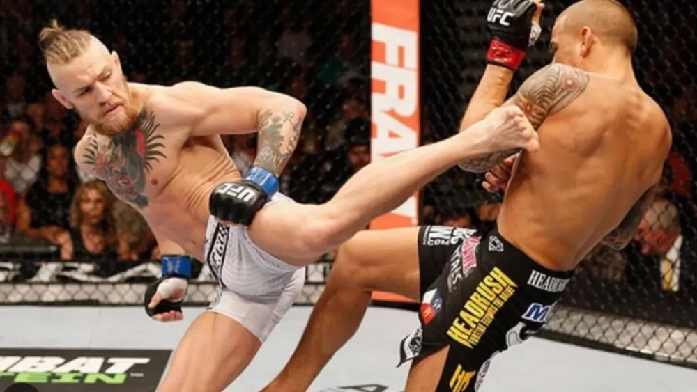 Image-of-Conor-McGregor-doing-a-roundhouse-kick-in-a-match